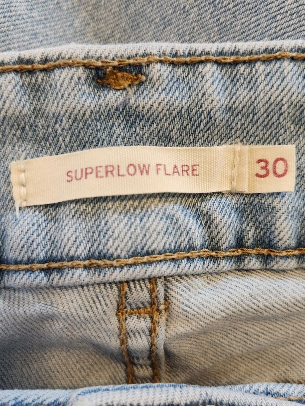 Levi's Light Wash Superlow Flare Jeans Size 30 - Picture 8 of 9